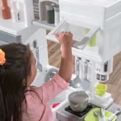Step2 Downtown Delights Play Kitchen With 24 Piece Accessory Play Set -Outdoor Toys-Step2 73bbd081 60ab 46ec 8359 c1d8864d0eda 1.918399077cc1ca4ee86aae97bb5ff8fc